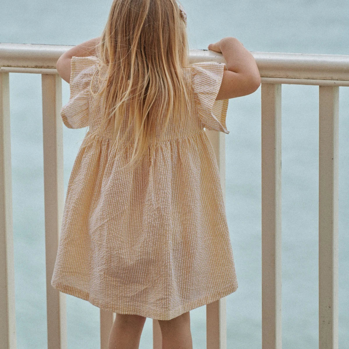 Nature Baby Bonnie dress seersucker in Golden stripe
