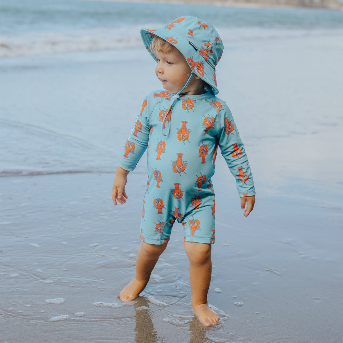 Crywolf rash suit in Little Lobsters