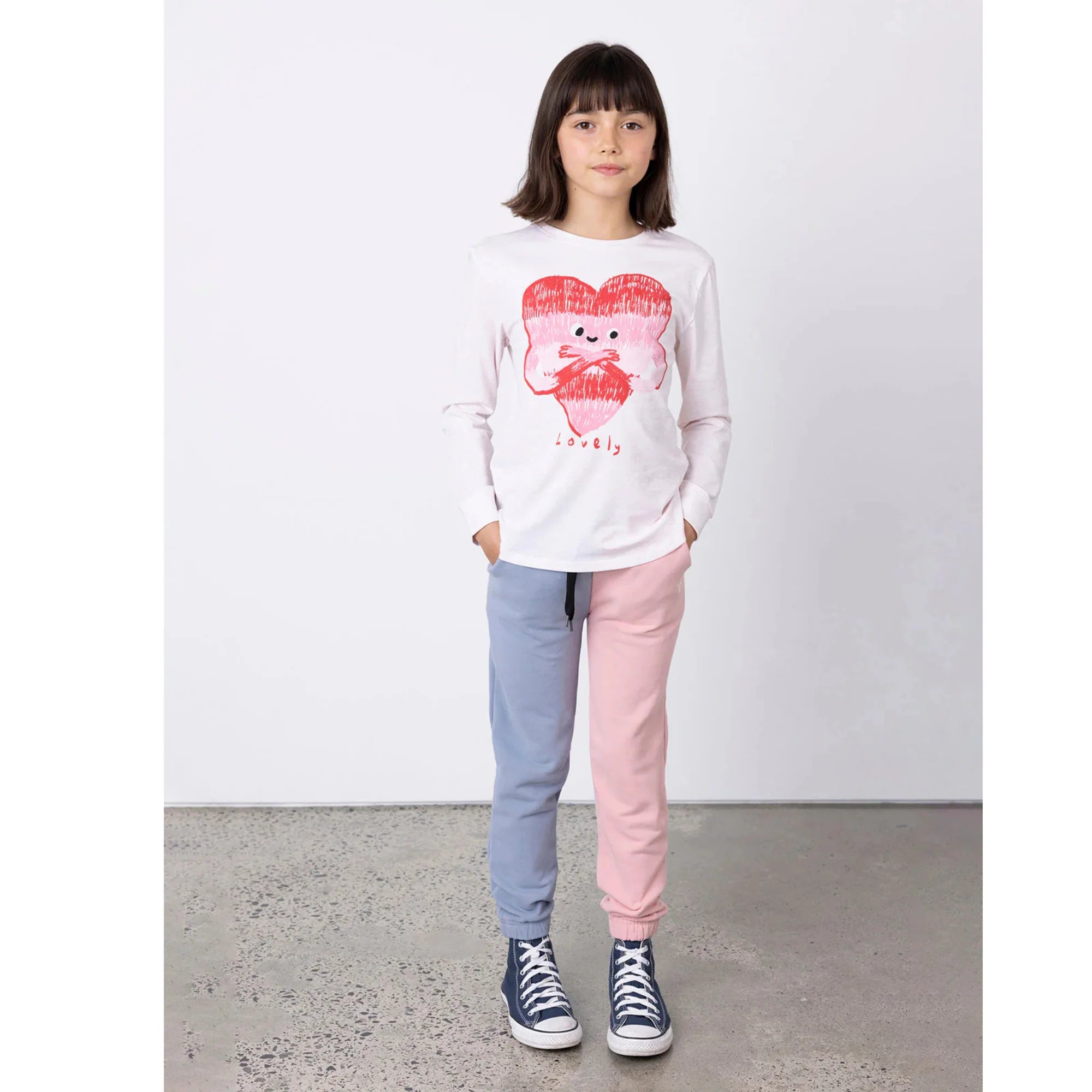 Minti Furry opposite Trackies in blue and pink