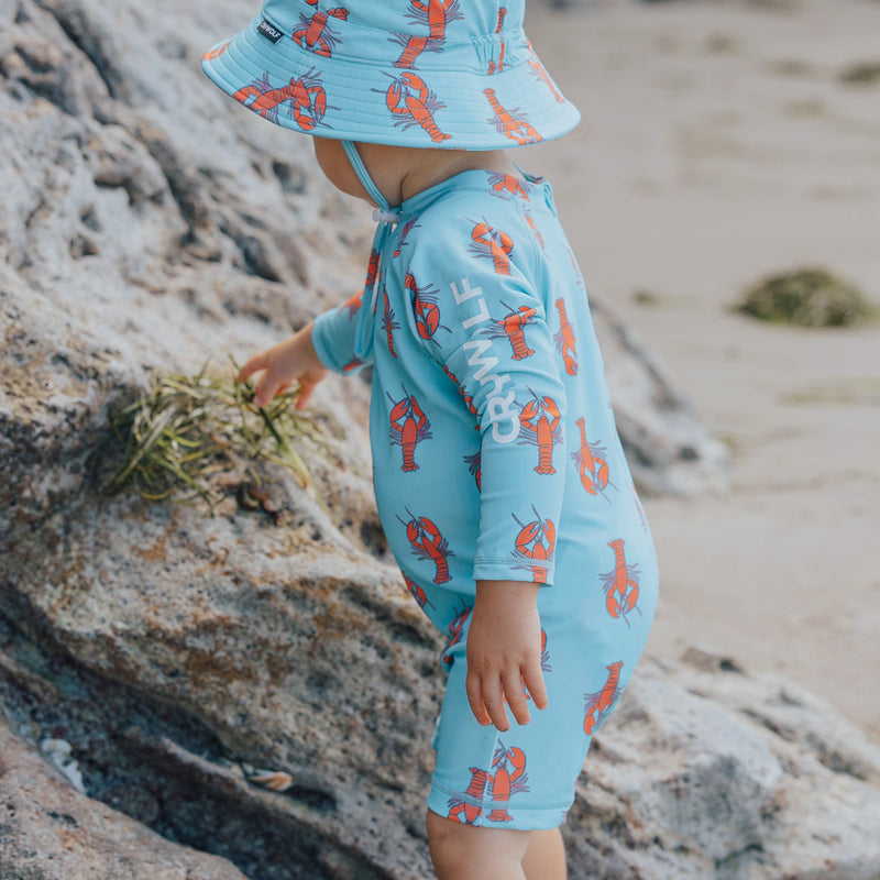 Crywolf rash suit in Little Lobsters