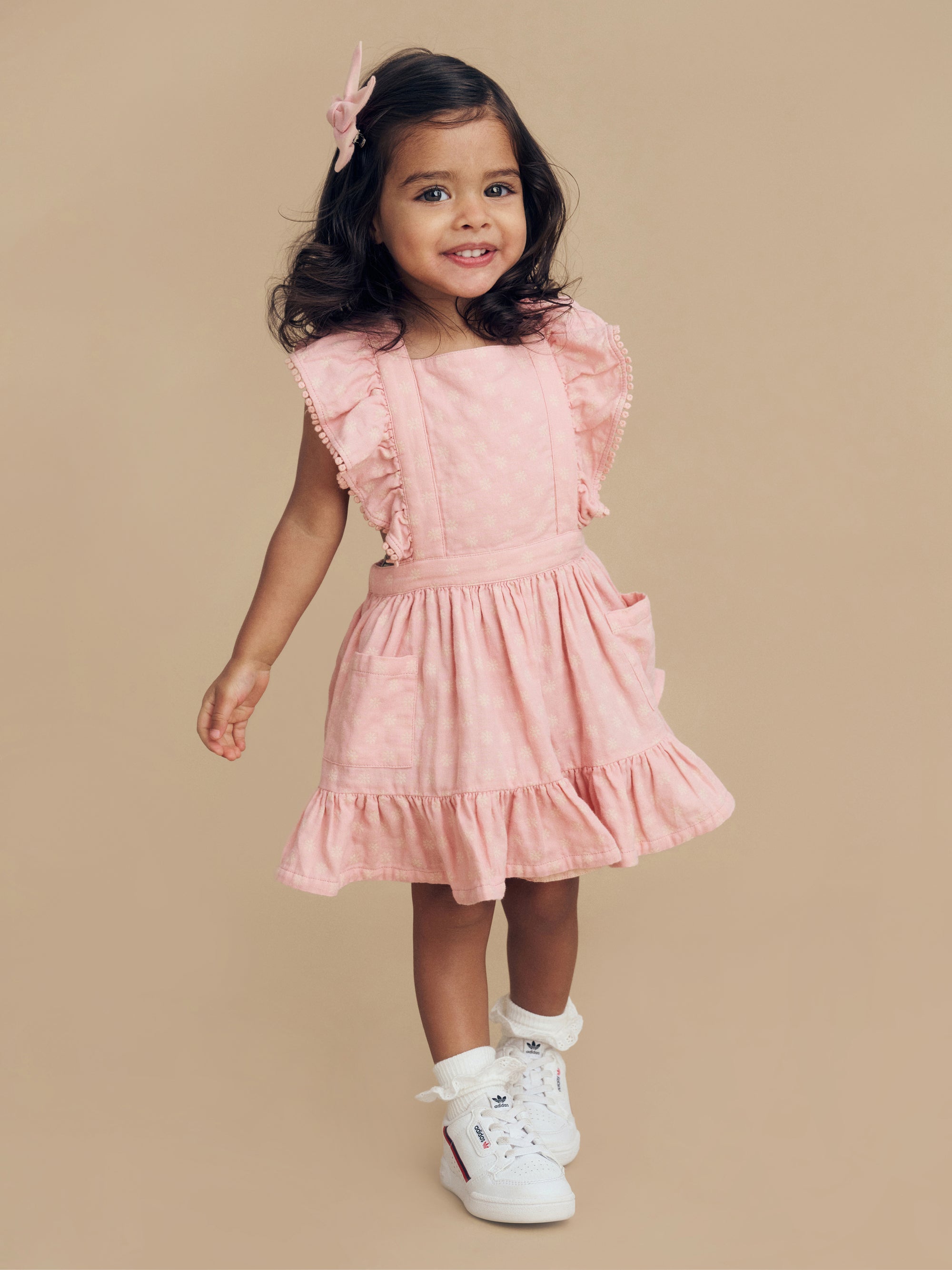 Huxbaby Daisy Reversible Bib Dress Dusty Rose and Sunkiss in Multi