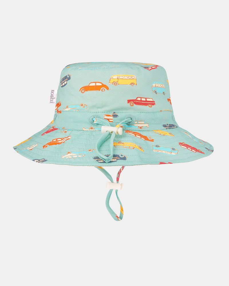 Toshi sunhat odyssey wagon wheels in green