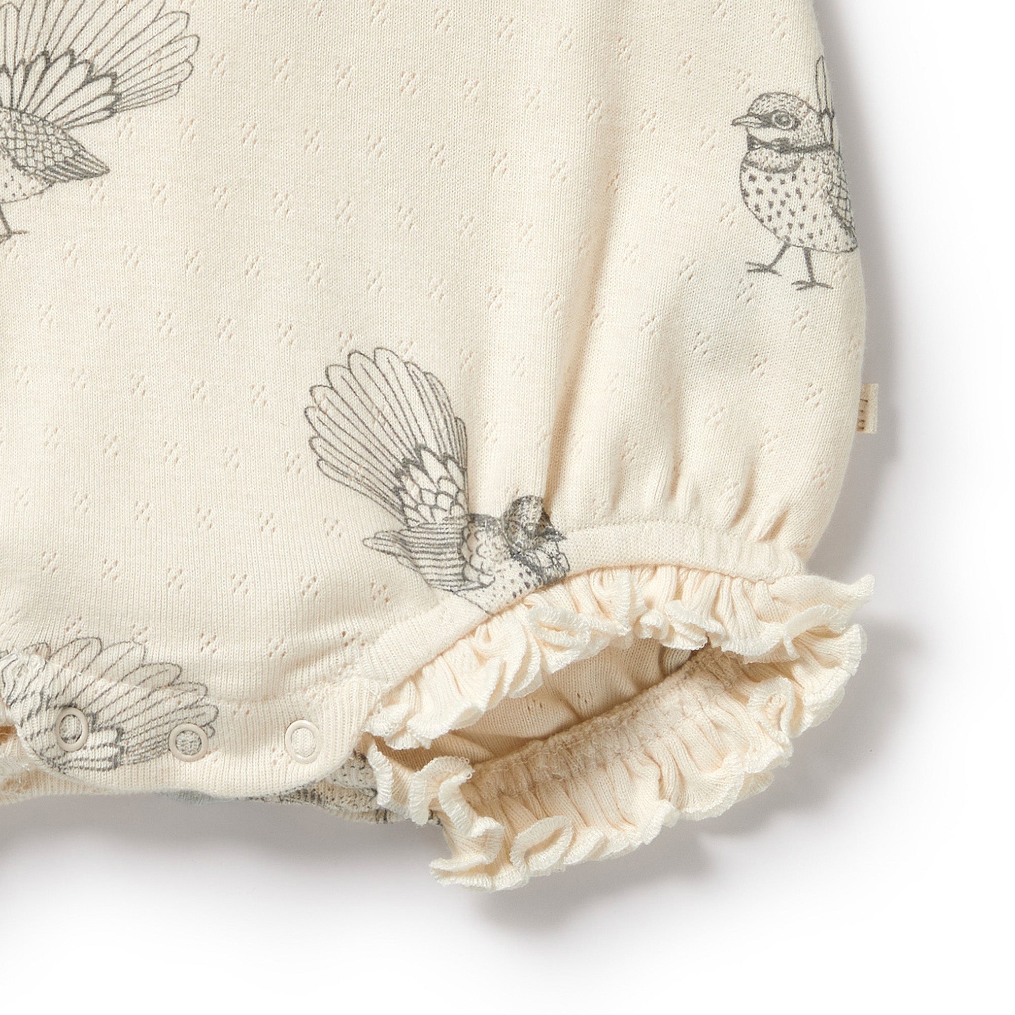 Wilson & Frenchy Little Fantail Organic Cotton Pointelle Ruffle Growsuit in white