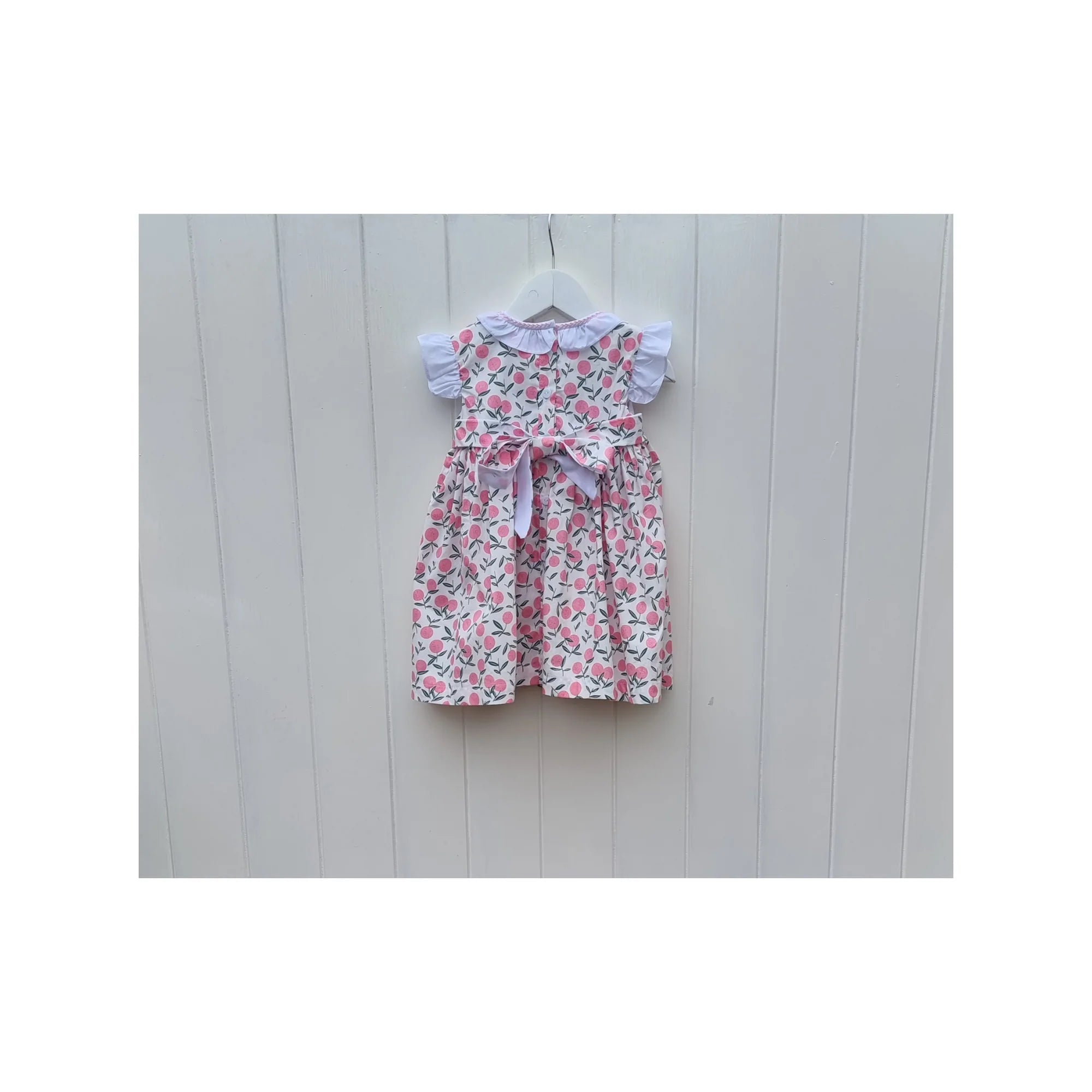 Smox Rox Summer smocked dress in white and pink