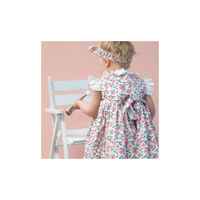 Smox Rox Summer smocked dress in white and pink