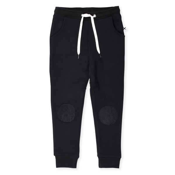 Mint furry circle knees trackies in black